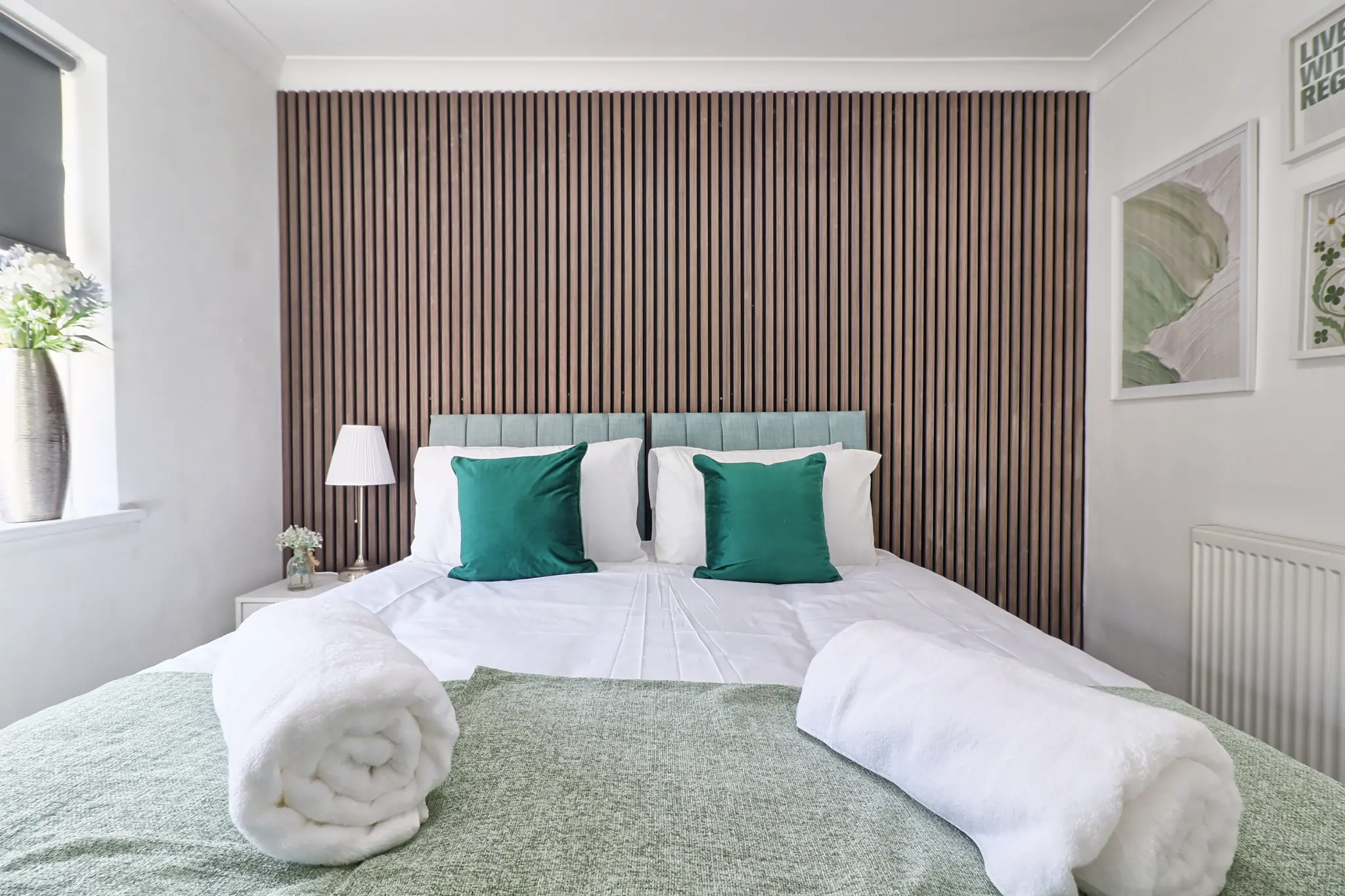 Quality contractor bedroom with modern decor and fresh linen in Romford